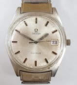 A gentleman's stainless steel Omega manual wind wrist watch, with date aperture, on associated