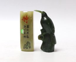 * * A carved spinach green jade model of a bird and a Chinese soapstone scroll weight, largest 7cm