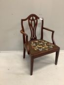 A George III mahogany elbow chair with tapestry seat, width 58cm, depth 45cm, height 92cm