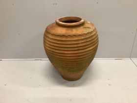 A Greek style terracotta oil jar, height 76cm