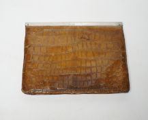An Edwardian lady’s silver mounted crocodile clutch bag