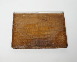 An Edwardian lady’s silver mounted crocodile clutch bag