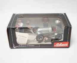 Schuco boxed Grand Prix racer at pit stop