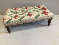 A Victorian style rectangular stool with Kilim covered seat on turned mahogany legs, width 111cm,