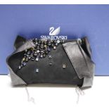 A Swarovski diamanté decorated black suede and leather evening bag, with chain handle, dust bag, box