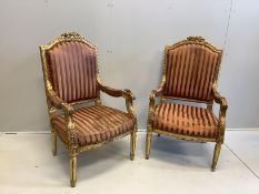 A pair of carved giltwood and composition elbow chairs, width 61cm, depth 51cm, height 108cm