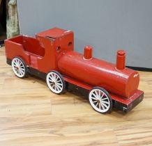 A painted wood pull along locomotive, 96cm