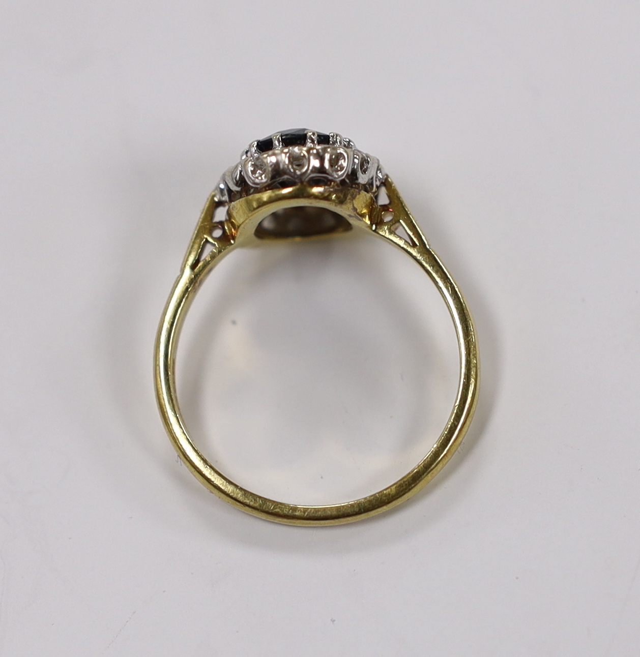 A modern 18ct gold, sapphire and diamond set oval cluster ring, size Q, gross weight 4.9 grams. - Image 3 of 3