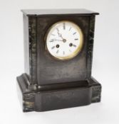 A black slate and marble mantle clock, 6.5cm high