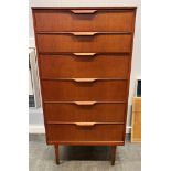 AN AUSTINSUITE TEAK TALLBOY the six graduated drawers with pull handles, 64cm wide 42cm deep 124cm