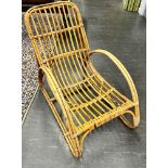 AN ART DECO SHAPED BAMBOO LOUNGE CHAIR 55cm wide 102cm deep 77cm high Condition Report : good