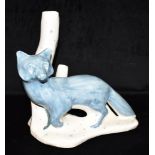 DAVID SHARPE FOR RYE POTTERY: a figure of a fox, standing by tree trunk, 29cm high Condition