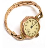 A 9CT ROSE GOLD LADIES VINTAGE WRISTWATCH anonymous cream dial, 'silvered' Arabic numerals, blue