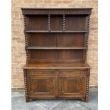 A LARGE 1930S OAK DRESSER the rack with spiral turned uprights, base with pair of drawers above