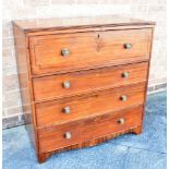 A WILLIAM IV SECRETAIRE CHEST the secretaire drawer fitted with an arrangement of drawers and