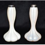 A PAIR OF SILVER MOUNTED IRIDESCENT GLASS VASES of lobed form, the silver collars hallmarked