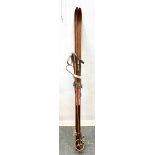 A PAIR OF VINTAGE 'TOR' WOODEN SKIS 120cm high, and pair of bamboo ski sticks Condition Report : agr