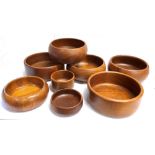 EIGHT VARIOUS MID CENTURY TEAK BOWLS the largest 25cm diameter Condition Report : good condition