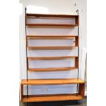 A BAY OF SECTIONAL SHELVING comprising pair of steel uprights supporting five graduated oak box