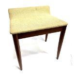 ARTHUR EDWARDS FOR WHITE AND NEWTON: a teak framed dressing stool, on tapering supports, 45cm wide