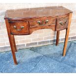 AN EARLY 19TH CENTURY MAHOGANY SIDE TABLE with three frieze drawers, on square chamfered supports,