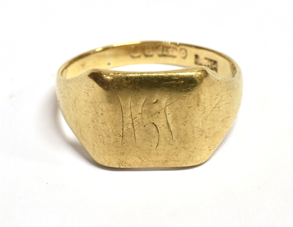 A 9CT GOLD SIGNET RING partial engraved letters to the bezel, hallmarked for Birmingham, date letter