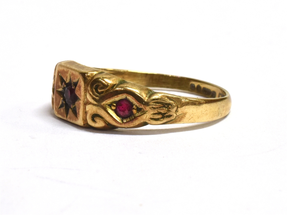 A VINTAGE 9CT GOLD RUBY GYPSY RING The ring set with three round cut rubies, the central ruby star - Image 3 of 3