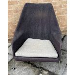 A 1950S/60S UPHOLSTERED ARMCHAIR on metal supports, 82cm wide 84cm high Condition Report : two