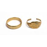 TWO RINGS a 9ct gold band ring, width 5mm, London hallmark, ring size W, weight 4.4g, and a yellow