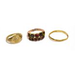 THREE GOLD RINGS A 22ct gold band ring, the shank buckled, weight 1.4g, a 9ct gold signet ring, ring