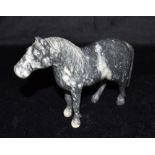 A CHINESE CARVED HARDSTONE FIGURE OF A HORSE with finely carved mane and tail, 16cm high Condition