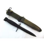 MILITARIA - A U.S. M8A1 KNIFE BAYONET with a 16.5cm blackened blade, in its scabbard, overall 32.5cm