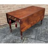 A LARGE VICTORIAN MAHOGANY PEMBROKE TABLE in the manner of Gillows, fitted with frieze drawer