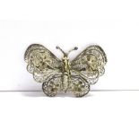 FILAGREE BUTTERFLY BROOCH The brooch in unmarked white metal measuring 4.9cm X 3.2cm approx. the pin