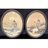 A PAIR OF CHINESE OVAL PAINTINGS ON SILK each depicting a lady in landscape setting, 24.5cm x 19.5cm