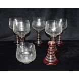 A SET OF SIX VERY LARGE HOCK GLASSES the bowls engraved with vine leaves and grapes, 27.5cm high