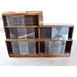 A SECTIONAL BOOKCASE fitted with five pairs of sliding glass doors, 152cm wide 104cm high 26cm
