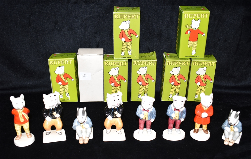 EIGHT BOXED JOHN BEWSICK RUPERT BEAR FIGURES: 2 x Rupert Bear (in two different poses); 2 x Pong