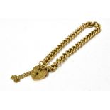 A VINTAGE 9CT HEART PADLOCK CURB LINK BRACELET width 5mm approx., length 17cm approx., weight 14.6g,