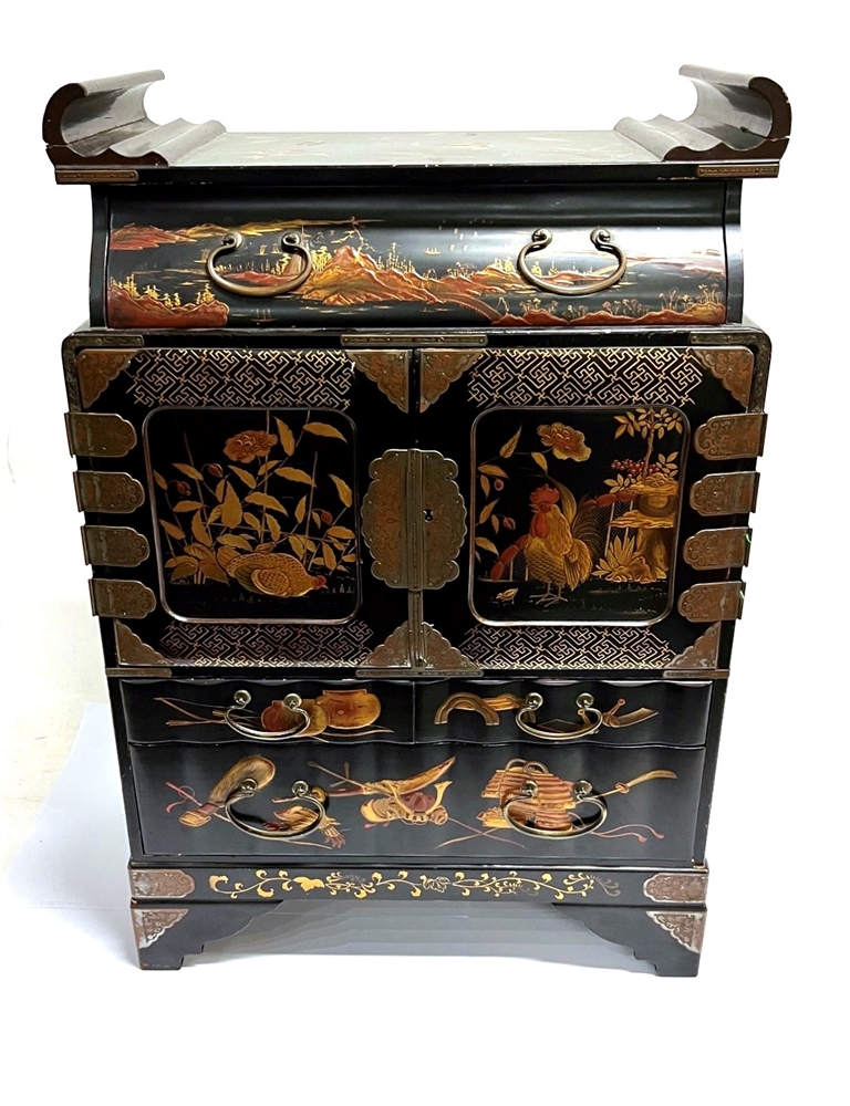 A JAPANESE LAQUERED TABLE TOP CABINET fitted with drawer above pair of doors opening to six drawers,
