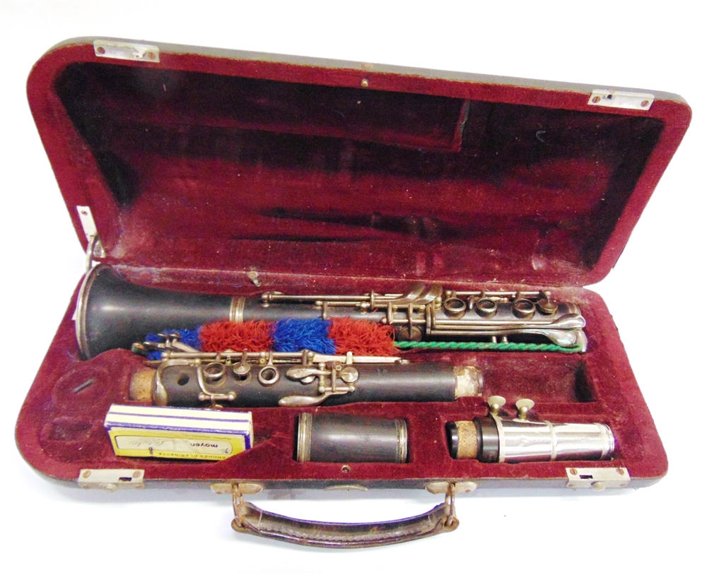 A CLARINET the main body marked 'MB C / ARTIST' and the mouth-piece section 'BUFFET / Crampon &