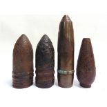 MILITARIA - FOUR ASSORTED SHELLS most in excavated condition, the largest 31cm high.