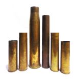 MILITARIA - SIX ASSORTED BRASS ARTILLERY SHELL CASES the largest marked '90MM M19', dated 1944,