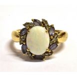 QVC 9CT GOLD OPAL CLUSTER RING The oval white Pinfire opal measuring approx 1 x 0.8cm in a mount