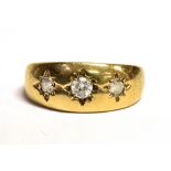 9CT GOLD PASTE SET GYPSY RING The ring set with three star set clear paste stones, worn 375 hallmark
