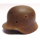 MILITARIA - A SECOND WORLD WAR GERMAN THIRD REICH STAHLHELM [STEEL HELMET] lacking original