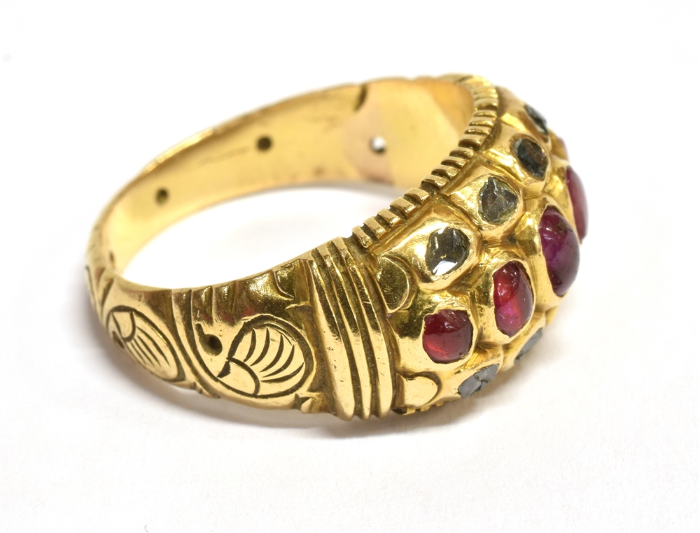 A RUBY AND SAPPHIRE CLUSTER RING The horizontal dome cluster set with five graduated oval rubies and - Image 2 of 3