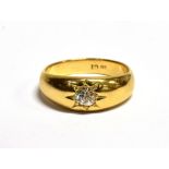 A STAMPED 18CT OLD CUT DIAMOND SOLITAIRE GYPSY RING The old cut diamond measuring approx 3.5mm in