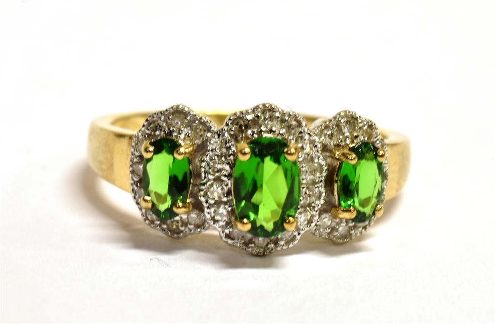 QVC 9CT GOLD, DIAMOND GEM SET TRILOGY RING The ring set with three green graduated oval gemstones in