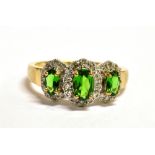QVC 9CT GOLD, DIAMOND GEM SET TRILOGY RING The ring set with three green graduated oval gemstones in